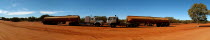 Panorama of rusting tankers on redut dust dirt road.Antipodean Aussie Australian Oceania Oz