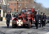 Fire truck at the funeral of a fireman.