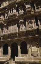 Patwon-ki-Haveli 1800-1860.  Sandstone house of wealthy merchant.  Part view of highly decorated exterior facade.