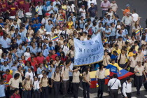 School children participating in a march in support of President Hugo Chavez along the Avenida Francisco de Miranda.