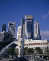 Merlion fountain in front of The Fullerton Hotel with highrise banks and office buildings behind.