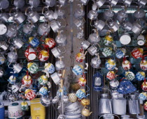 Painted and metal teapots for sale at the Great Souq.