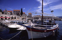 Bol marina.The village of Bol  located on the southen coast of Brac  is one of the islands most beautiful locations with its idyllic marina and golden beachsouthern Dalmatiaboats