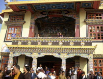 A highly decorated temple outside Swayambhunath Stupa busy because its the day of the full moon an important day for Buddhists  Important Buddhist sitepopularbusytourist attractionBuddhismsymbo...