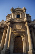 Church and Convent of San Domenico. Baroque golden sandstone facade with angled view of doorway