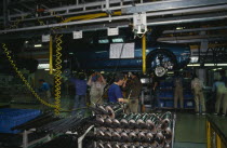 Workers on factory floor of Volkswagon production plant. Saxony