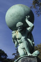 Nonesuch Statue depicting  life size nineteenth century copper figure of Hercules carrying sphere on his shoulders.Great Britain United Kingdom