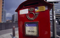 Post box with collection times.
