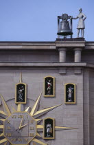 Detail of building facade and Jacquemart clock.  Figures representing citizens of Brussels surround the clock face and move to announce the change of hour.