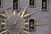 Detail of building facade and Jacquemart clock.  Figures representing citizens of Brussels surround the clock face and move to announce the change of hour.