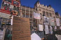 Hand-written posters and signs attached to railings outside Parliament to demonstrate against Socialist leader Ference Gyurcany  50 years after 1956 uprising againist communist rule.