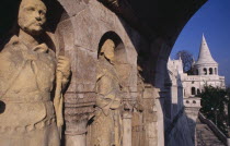 Carved stone figures lining archway with Fishermen s Bastion.Eastern Europe  Eastern Europe