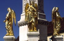 Cathedral statues of angels. Outside the cathedral stands Antun Fernkorns gilded statues of four angels protecting the MadonnaReligious sculpture