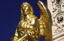 Cathedral gilded angel. Outside the cathedral stands a golden Madonna surrounded by angels sculpted by Antun FernkorReligious sculpture