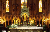 Cathedral main altar. The cathedrals altar is modelled on the countrys famous statue of the Madonna and Child from the revered church and place of pilgrimage at Maria BistricaHoly sites