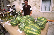Man selling watermelons. The streets of old town Buzet are a riot of colour and traditional foods during Septembers Buzet Subotina weeken  Festivals
