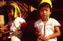 Nai Soi Long neck Karen children. Originally from Myanmar  the Long neck Karen  Padaung  people fled persecution in their native land and settled across the border in Thailand where they have become s...