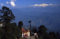 Bhutia Busty Gompa and Mount Kanchenjunga beyond the Buddhist monastery  which houses the original copy of the Tibetan book of the dead  looks out over the Himalayan foothills and on to the peaks of t...