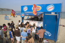 A group of children queuing at Ice Cream stallGreat Britain United Kingdom UK