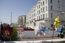 Display of colourful wind veins outside a seaside shop Great Britain United Kingdom Colorful Store UK