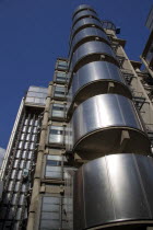 Lloyds of London building polished metal exterior with elevators on the outside. Deigned by Architect Sir Norman Foster.United Kingdom  City Great Britain UK