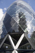 The Swiss Re building 30 St Mary Axe alternatively known as the Gherkin seen from street level. Designed by Architect Sir Norman Foster.United Kingdom  City Great Britain UK