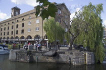 St Catherines dock former warehouses now luxury  apartments. Extending foobridge withdrawn to although boats through the lock.United Kingdom  Flats Willow Tree Great Britain UK