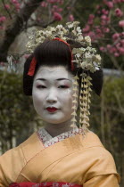 Geisha in Sannen-zaka gardenAsia PeoplePortraits