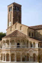 The colonnaded exterior of the Basilica dei Santa Maria e Donato on the Canale di San Donato on the lagoon island of Murano