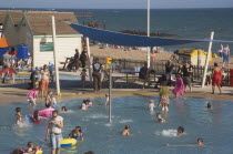 Childrens seafront paddling pool area.Great Britain United Kingdom