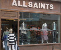 Shoppers entering the All Saints shop in Dukes street. 50% sale written on the window.Great Britain Store United Kingdom