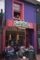 People sat outside the Dumb Waiter cafe in Sydney street  North Laines area.Great Britain United Kingdom