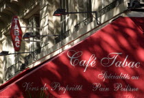 Cafe Tabac sign and pavement awningBar Bistro European French Restaurant Western Europe