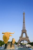 Fountain sculpture of cow and calf in the Trocadero Gardens with the Eiffel Tower beyondEuropean French Western Europe