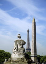 View across the Place de la Concorde showing the Obelisk and the Eiffel Tower and a sculpture representing a French city in the foregroundEuropean Western Europe