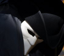 Masked Carnival costumed figure as a shop display Store