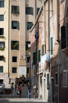 One of the three entrances to the Jewish Ghetto in Cannaregio district. A small bridge  the Ponte de Gheto Novo  at the end of a narrow street leads across a canal into the Ghetto