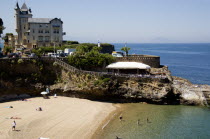 The Basque seaside resort on the Atlantic coast. The Plage de Port-Vieux with a seafood restaurant on a promontory at the end of the beach