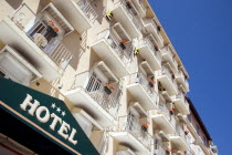 The Basque seaside resort on the Atlantic coast. Three star hotel sign and balconies