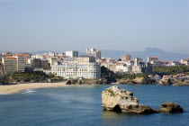 The Basque seaside resort on the Atlantic coast. The Grande Plage with the Bellevue Conference Centre in the middle and the Pyrenees mountains in the distance.