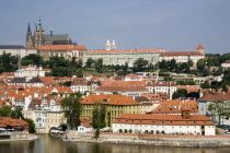 View across the Vltava River to the Little Quarter overlooked by Prague Castle and St Vitus Cathedral
