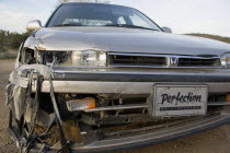 Damaged front of a crashed car Automobile