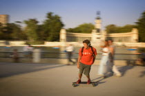 A Skate boarder in Retiro Park  motion  blur  movementTravelHolidaysTourismLeisure