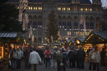 Crowds at the Rathaus Christmas Market  festive decorations.TravelHolidaysTourismYuletideAdventChristmas TreeChristmas MarketChristkindlesmarkt