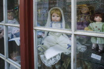 Assorted porcelain dolls in a shop window.ToysTradeCommerceHolidaysTourismTravelFlemish Region