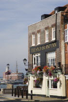The Spice Island Inn at Old Portsmouth with HMS Warrioir and the Historic Dockyard beyond