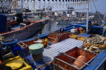 Fishing trawlers in harbour of east coast fishing port.