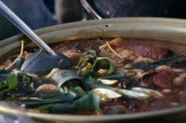 Offal stew for sale in market.