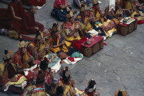 Monks chanting during Buddhist ceremony.