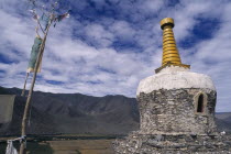 Chorten and prayer flags.Yambulagang